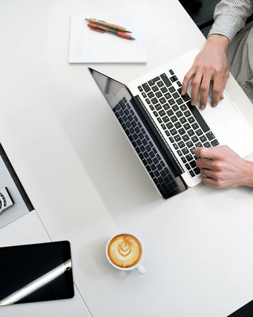 Person working on laptop in office